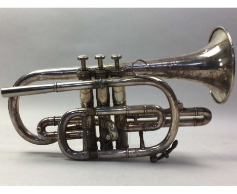 20TH CENTURY CORNET AND A TRUMPET the cornet inscribed 'Boosey &amp; Hawkes of London', casedQty: 2