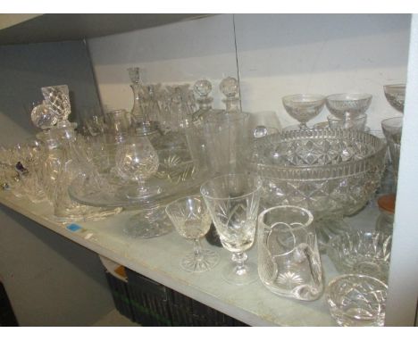 A quantity of cut and pressed table glass to include a pair of early 20th century candlestick lustres, Waterford Colleen deca