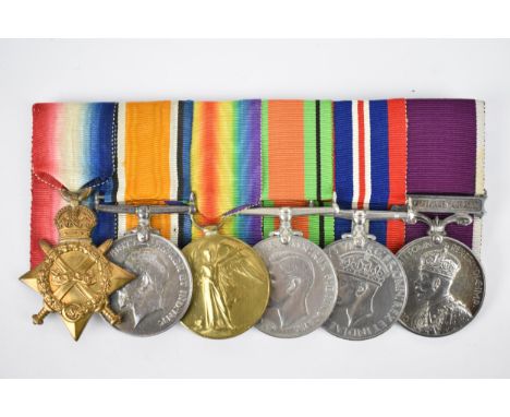 A WWI and WWII medal group comprised of six medals to include 1914-15 Star, 1914-18 British War medal and Victory medal, each
