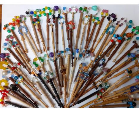 A collection of antique and modern collectable lace bobbins to include dot inscriptions, two silver bobbins commemorating Pri