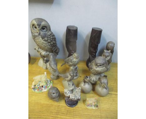 Poole pottery ornaments to include model birds, owls and a squirrel, together with Lilliput Lane cottages, Country Bird colle