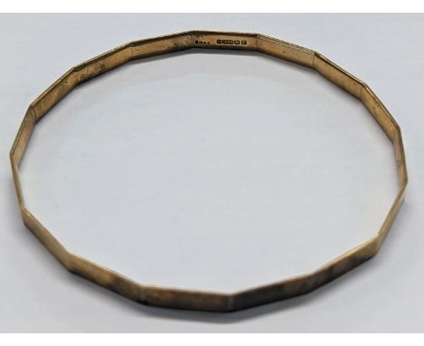 A 9ct gold bangle in hexadecagon form13.9g Location: Cab 