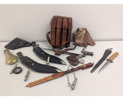 A mixed lot of WWII and later related items to include an ARP whistle, Gurkha Rifles kukri, socket bayonet, leather holsters,