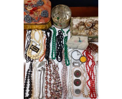 Early to mid 20th Century costume jewellery to include painted glass bead necklaces, brooches and an early 20th Century hair 