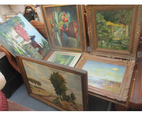 A selection of oil paintings to include R Mesmaeker - oil on canvas depicting a man walking with a church to the background, 