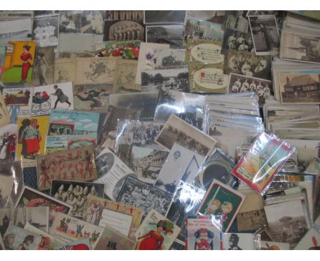 A quantity of postcards, mainly early 20th century to include Giraffe comical examples, a signed Johny Rix card, Coronation c
