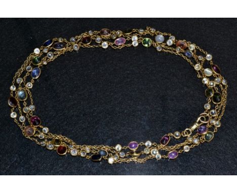 An antique multi stone yellow metal fancy muff chain necklace, periodically inset with an individually mounted coloured stone