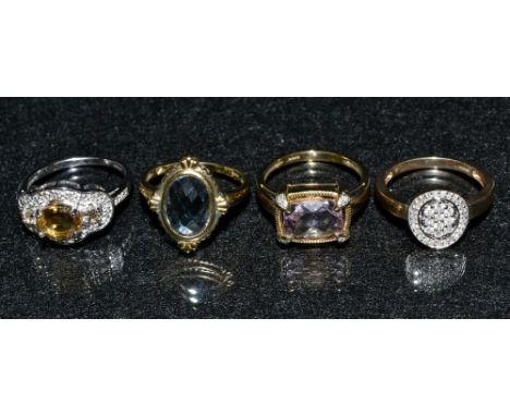 Rings - a 9ct white gold dress ring; a 9ct yellow gold ring, set with a Topaz; a 9ct yellow gold Rose de France amethyst ring