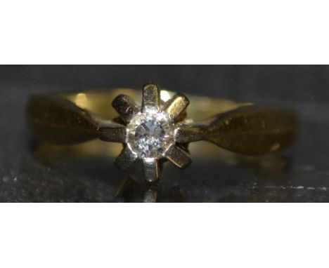 A diamond solitaire ring, round brilliant cut diamond, 0.13ct, eight tooth crown setting, 14ct gold shank, size K, stamped 58