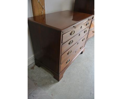 A Georgian mahogany chest with a slide above four graduating drawers on bracket feet - 81cm  tall x 97cm x 55cm - in good res