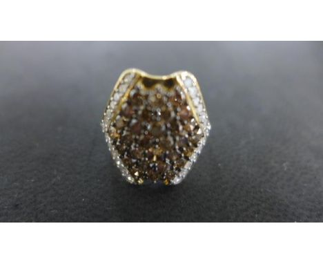 A yellow gold cluster ring, size N, 9ct gold, approx 3.3 grams - the thirty central brown diamonds flanked by 26 round cut di