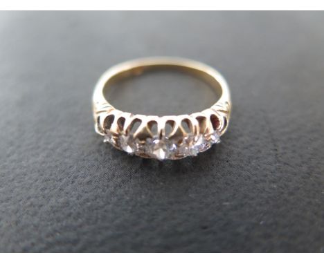 An 18ct yellow gold five stone diamond ring, size L-M, approx 3 grams - light usage wear 