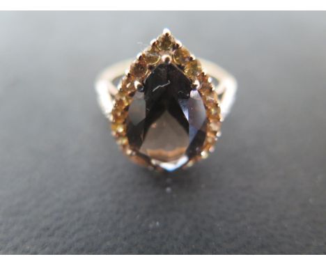 A 9ct yellow gold smokey quartz sapphire and diamond ring, size S, approx 4 grams - light surface scratches and usage wear 