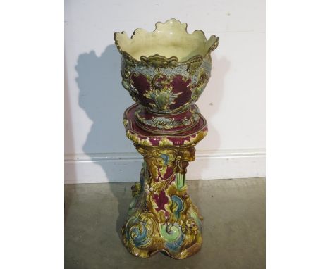 A ceramic jardiere on stand - 82cm tall x 33cm wide - repair to jardinere and some chipping 