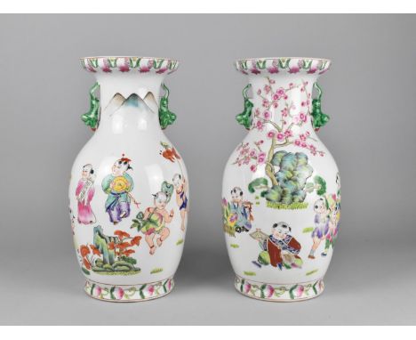 A Pair of 20th Century Chinese Porcelain Famille Rose Vases Decorated with Children at Play in Garden Setting, Red Seal Marks