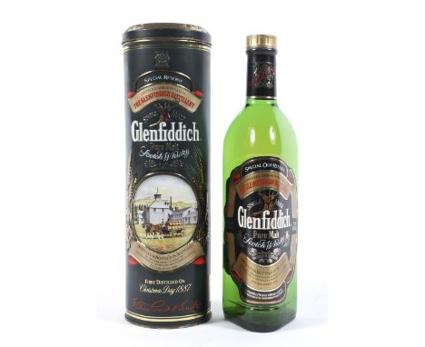 A bottle of Glenfiddich single malt pure malt Scotch whisky, distilled and bottled by William Grant &amp; sons, in original t