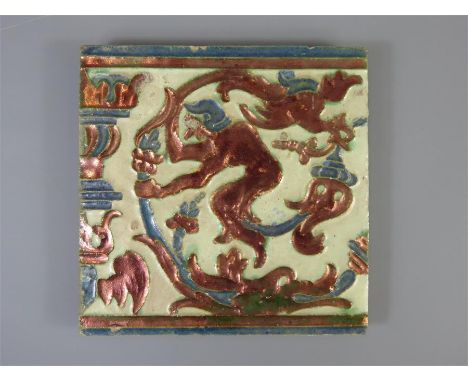 A 17th Century Spanish Lustre Ware Tile, depicting an imp, approx 18 x 18 cms.