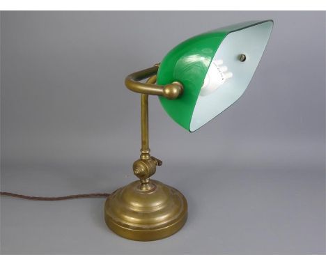 An Antique Heavy Brass 'Bankers' Desk Lamp with green glass shade, approx 34 cms (to top of horizontal shade).