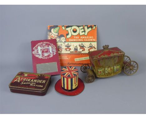 Royal Memorabilia, including a&nbsp;W &amp; R.Jacob &amp; Co Tin-Carriages Coronation Coach, figural biscuit in tin stamped f