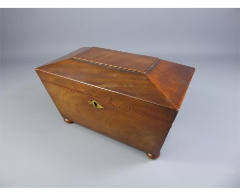 A Late Georgian Mahogany Tea Caddy, in the form a sarcophagus, approx 20 x 10 cms.