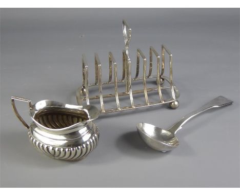 A Victorian Silver Toast Rack, Sheffield hallmark, dated 1899, mm J W Deakin, approx 200 gms together with a Victorian silver