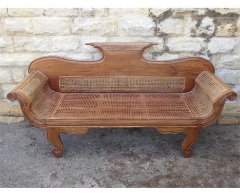 A Fruit Wood Vintage Rattan Seated Couch, with elegant curved arms and legs, approx 182 x 60 x 88 cms.&nbsp;
