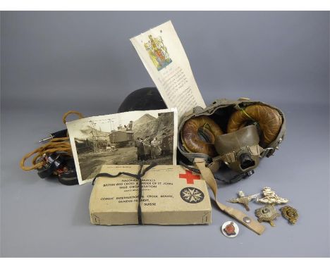 A Vintage Air Ministry Issue Pilots Cloth Helmet/Liner with integral radio receivers and an integral oxygen mask nr 22C/1730 