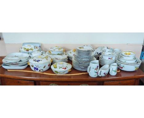 A Large Quantity of Royal Worcester Evesham-Ware; comprising eight tea cups and saucers, salt and pepper, honey pot and cover