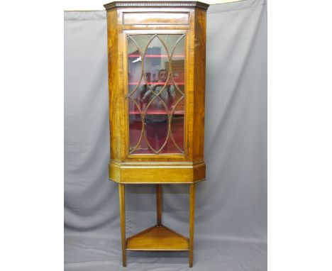 GEORGIAN MAHOGANY CORNER DISPLAY CABINET ON LATER STAND having twelve pane shaped bead single door, material covered interior