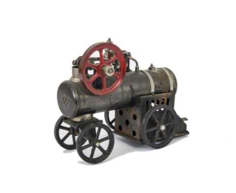 A Märklin Live Steam ‘Lokomobil’ 5½ Engine, with lacquered 55mm diameter boiler and black wheels, overall length 9”, one doub