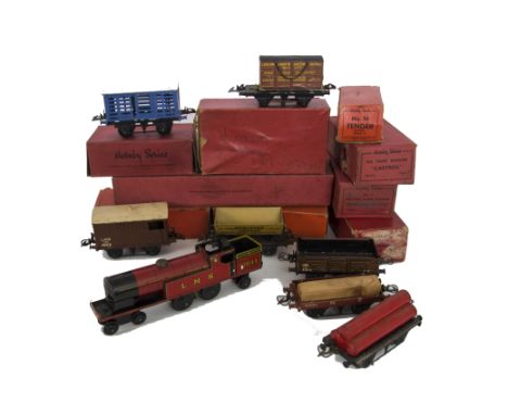 A Collection of Pre- and Post-war Hornby 0 Gauge Trains, including BR black no 50 clockwork locomotive and tender, boxed no 2
