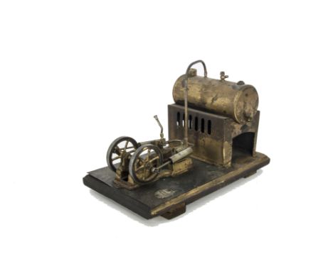A Twin-Cylinder Horizontal Stationary Steam Engine by Falk, with cast engine bed supporting the oscillating cylinders and twi