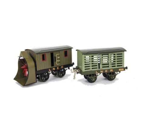 An Early Hornby 0 Gauge LNER Snowplough and Cattle Wagon, both VG, snowplough with slight damage to front of scoop and missin