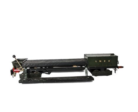A 5” Gauge ‘Ground-level’ Bogie Driving/Riding Trolley, with mechanical brakes to leading bogie, auxiliary water tank to rear