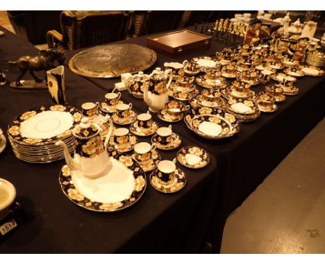 Large quantity of Royal Albert Heirloom pattern tea and dinnerware  CONDITION REPORT: Coffee pot has chip to lip of spout but