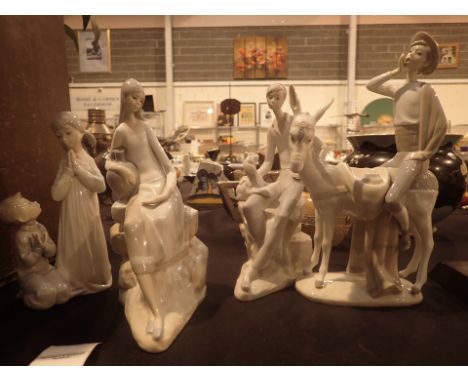 Group of four ceramic figures including two Lladro tallest H: 30 cm