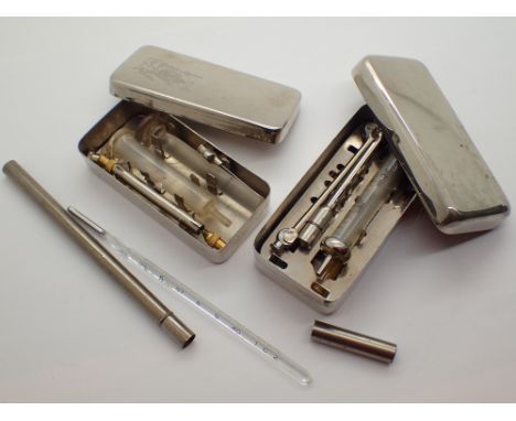 Two vintage boxed hypodermic needle and thermometers