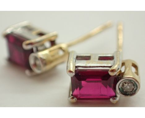 9ct gold emerald cut ruby and diamond stud earrings CONDITION REPORT: Please note there are no butterflies with this lot.