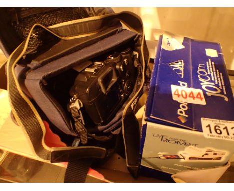 Two Polaroid cameras