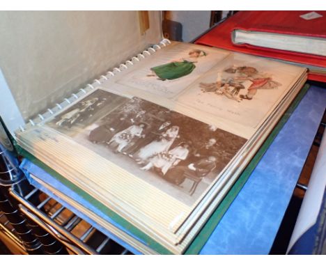 Two albums of vintage postcards including twelve Laurel and Hardy by Larry Harmon 1974