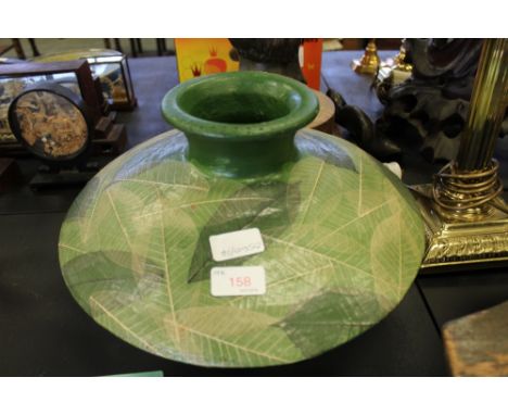 Large squat ceramic vase with foliate finish