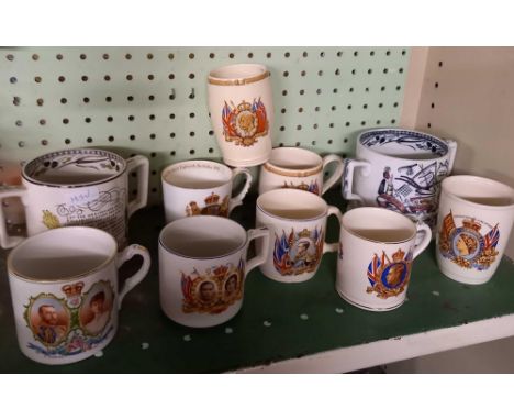 SHELF OF ROYAL COMMEMORATIVE MUGS