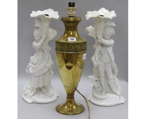 A pair of figural candlesticks and a lamp H.41cm