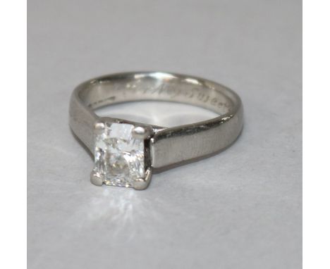 A modern platinum and radiant cut solitaire diamond ring, of good colour and clarity, the stone weighing approximately 1.80ct