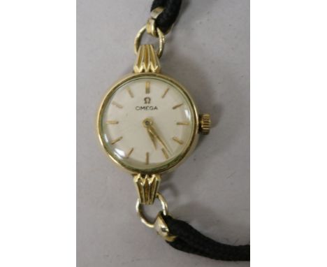 A lady's gold plated Omega manual wind wrist watch