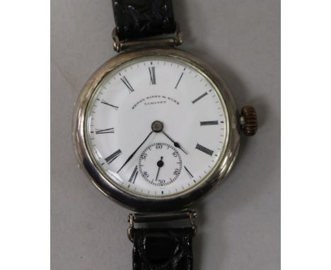 A gentleman's early 20th century silver manual wind wrist watch, retailed by Henry Birks & Sons.