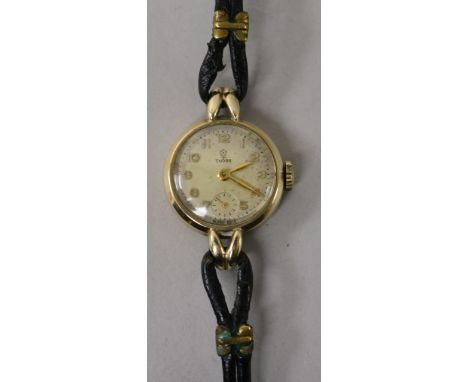 A lady's 9ct gold Tudor manual wind wrist watch.