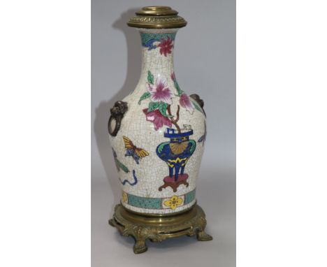 A Chinese famille rose crackle glaze vase, c.1900, mounted as a lamp H.35cm