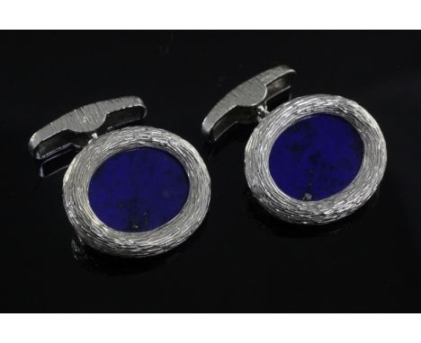 A pair of textured 18ct white gold and lapis lazuli oval cufflinks, 22mm.