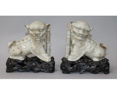 A pair of Chinese crackleglaze lion joss stick holders and stands H.11.5cm